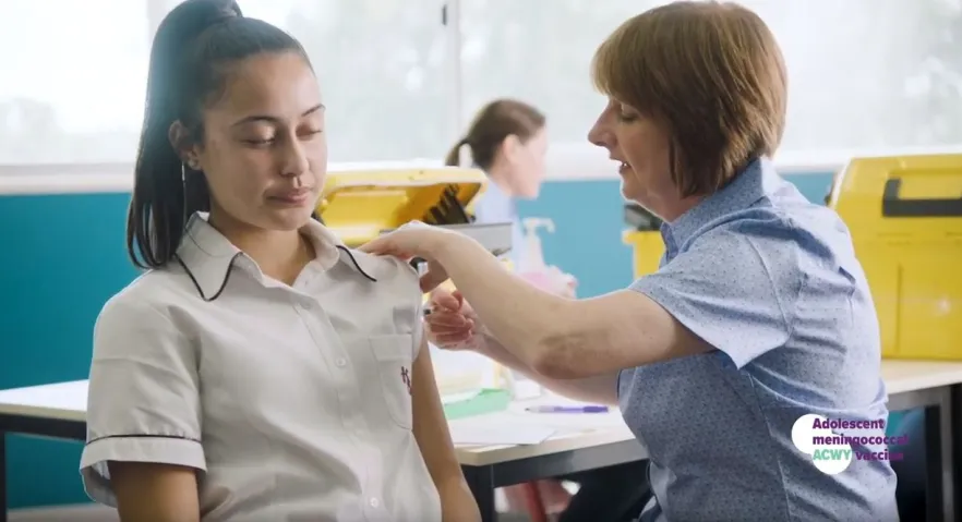 Image of girl and nurse providing vaccination