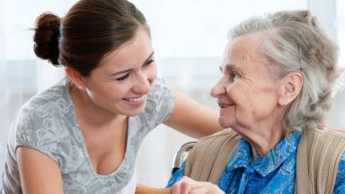 elderly woman and grandaughter.